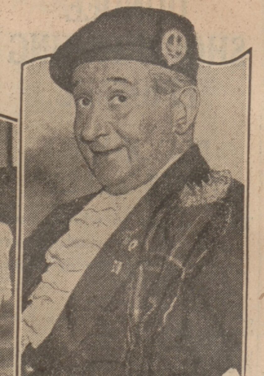 Vintage newspaper portrait of a person (Will Fyffe) in ceremonial Scottish dress.