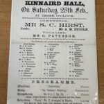 Black-and-white poster advertising the first of four Orchestral Promenade Concerts at Kinnaird Hall, Dundee, under the patronage of the Lord Provost, Magistrates and Town Council. Scheduled for Saturday 28 February at 3 p.m., the concert featured conductor S. C. Hurst, vocalist G. Paterson, a full orchestra roster, and a programme including works by Mozart, Gounod, Herold and Stasny. Admission prices and season ticket details appear at the bottom. The poster is creased and mounted beneath a protective plastic covering.