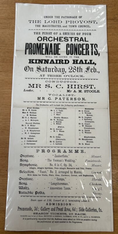 Black-and-white poster advertising the first of four Orchestral Promenade Concerts at Kinnaird Hall, Dundee, under the patronage of the Lord Provost, Magistrates and Town Council. Scheduled for Saturday 28 February at 3 p.m., the concert featured conductor S. C. Hurst, vocalist G. Paterson, a full orchestra roster, and a programme including works by Mozart, Gounod, Herold and Stasny. Admission prices and season ticket details appear at the bottom. The poster is creased and mounted beneath a protective plastic covering.