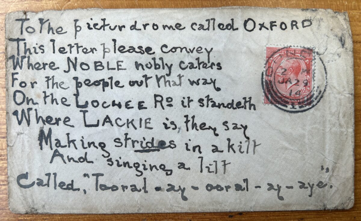 Worn handwritten envelope note addressed to the Oxford Picturedrome in Dundee, featuring a humorous verse about the music hall performer Lackie. A red postage stamp and postmark appear on the right-hand side of the note.
