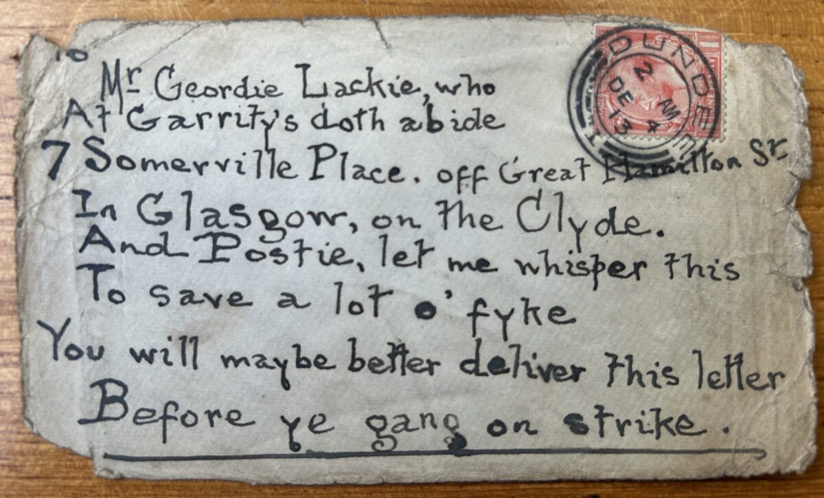 Worn handwritten postcard addressed to Geordie Lackie in Glasgow, featuring a Dundee postmark and stamp. The address is written in Scots verse, including a humorous message to the postman about delivering the letter before going on strike.